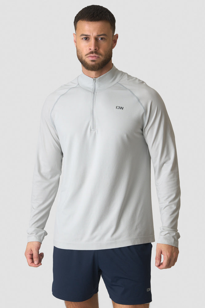 ICIW Stride 1/4 Longsleeve White Snow – Träningslångärm med 1/4 dragkedja för herr i vit